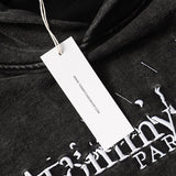 Washed and distressed ripped hoodie with distressed details