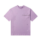Distressed ripped tee with unique pocket detailing and a mock neck