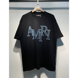 amri flow paint graffiti letter starry sky classic logo print short sleeve couple t-shirt