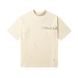 Distressed ripped tee with unique pocket detailing and a mock neck