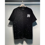 amri flow paint graffiti letter starry sky classic logo print short sleeve couple t-shirt