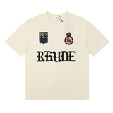 Rhude T Shirts Gothic Letter Badge Printing Cotton Casual Crew Neck Short Sleeve Men and Women