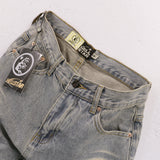 HS jeans Ripped and Repaired: Vintage Washed Denim Jeans with Distressed Style