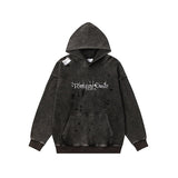 Washed and distressed ripped hoodie with distressed details